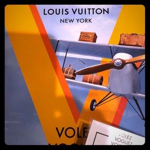 Louis Vuitton exhibit NYC program and pin